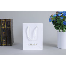 China Manufacturer White Paperbag with Logo Printed Gift Custom Shopping Paper Bag